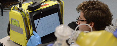 Student Using ECG Equipment in Class