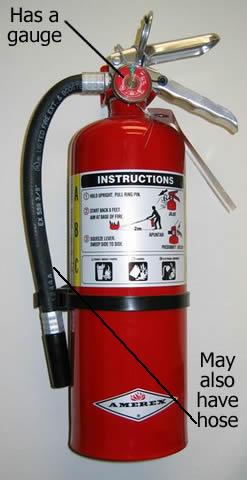 Dry Chemical Extinguisher - has a gauge. may also have a hose.