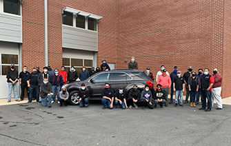 Automotive Students Accepting Donation