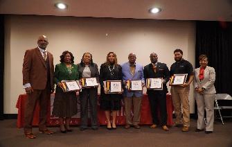 6 honorees stand with awards during the CVCC Black History Celebration on Tuesday, Feb 27th